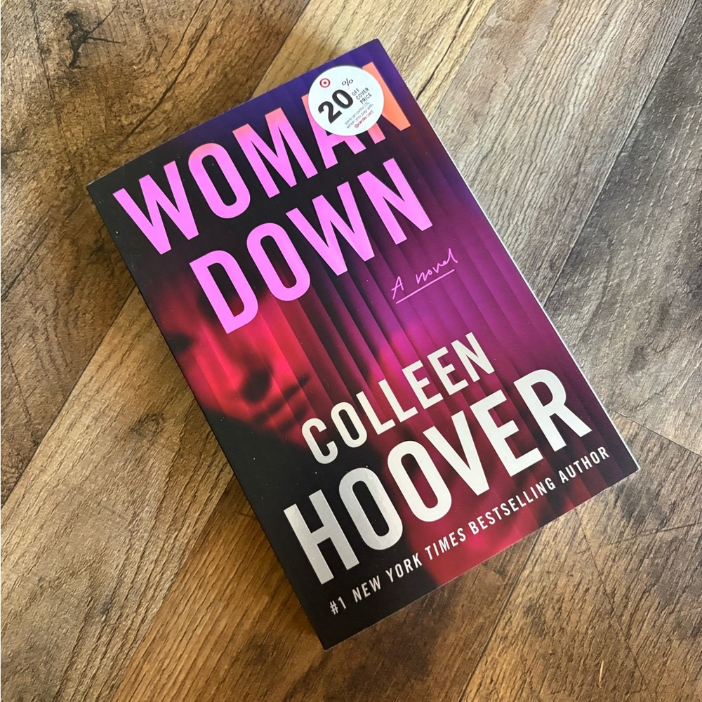 "Woman Down" Paperback - Pink/Purple Cover